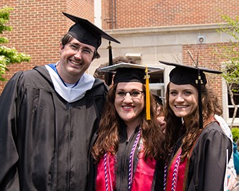 Andrew Ross with students