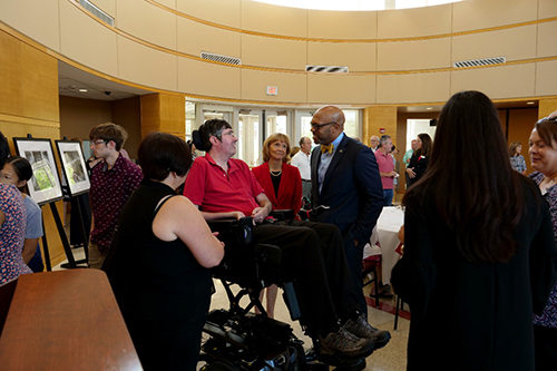 Andrew Ross with university officials